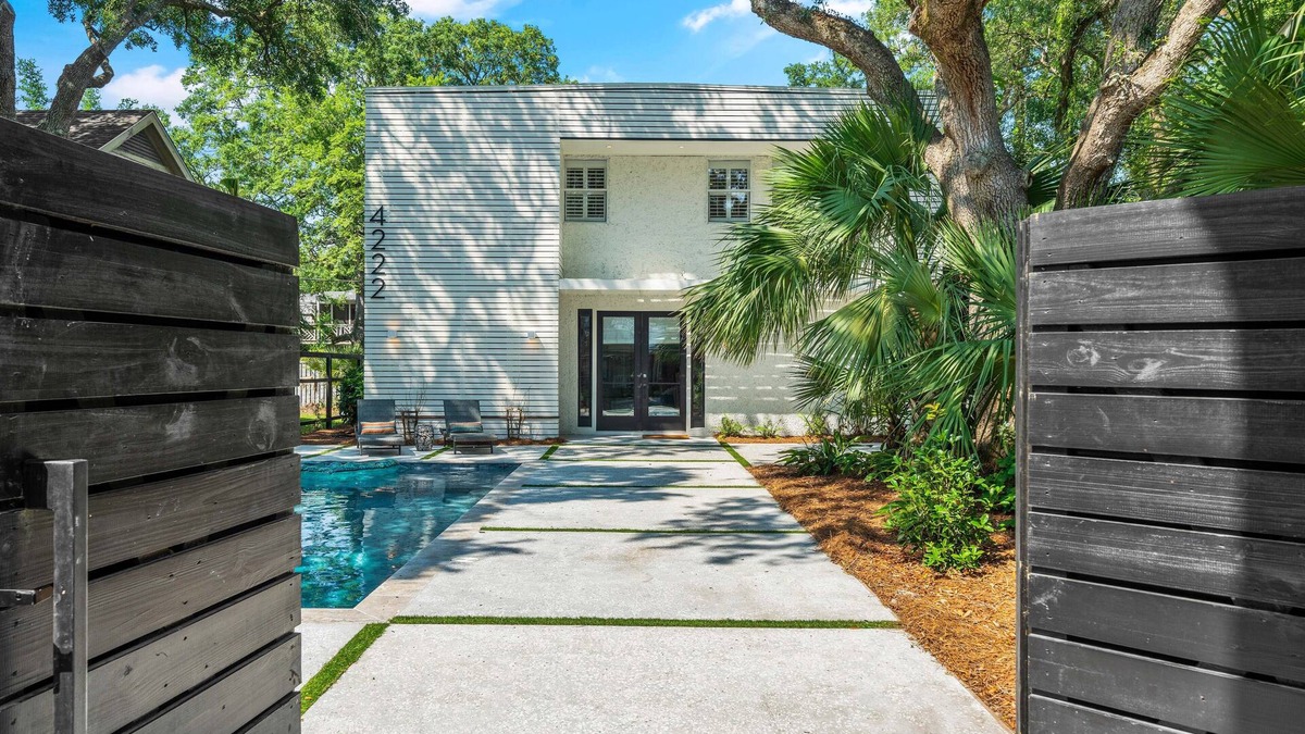 East Beach House | Zen-N-Sea offers poolside relaxation and near the beach entrance, sleeps 8