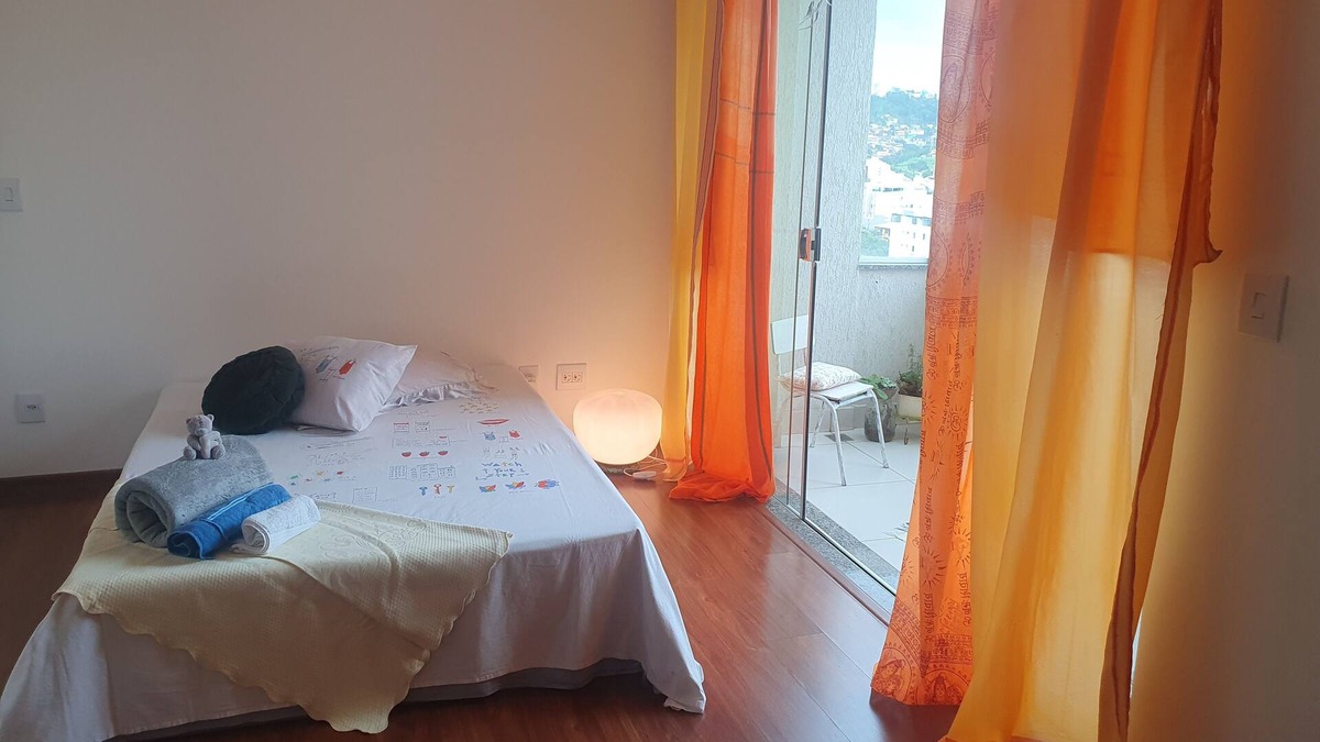 Buritis Apartment | Zen suit room, hot shower, balcony with a view and garage