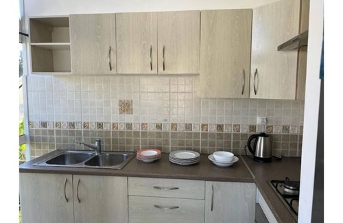 Antananarivo Avaradrano Apartment | 1 Bedroom Apartment with Air Conditioning 85 m² - Kitchen and Terrace
