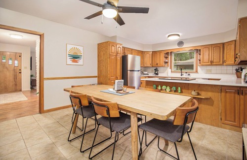 South Bend House | 1 mile from ND! Beautifully renovated and roomy 4-bed, 3-bath home, wooded lot.