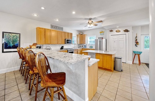 Plantation House | #1 Sunset Serenity: Bayfront, Pet Friendly, Sleeps 14, Community Pool!