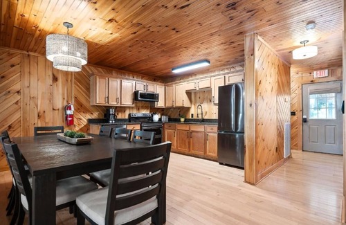 Allons Cabin | 10 Person Golden Cedar Lodge 16 - 2 Floors and a 3rd floor loft, entertainment room, full kitchen