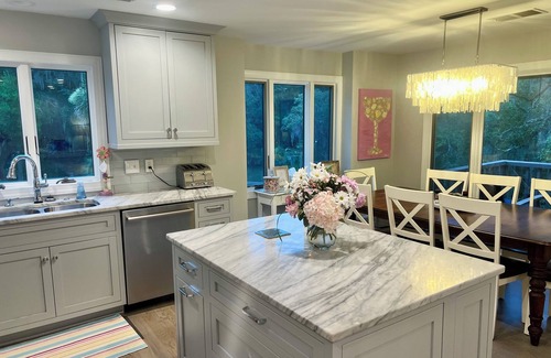 West Beach Villa | 1333 Fairway Oaks: 4BR Villa, Lagoon Views, Short 5-7 min. stroll to the Beach!