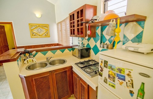 Villas Ana Maria Apartment | 1BD chica-friendly condo steps from clubs, free breakfast, pool/AC/TV/wifi!