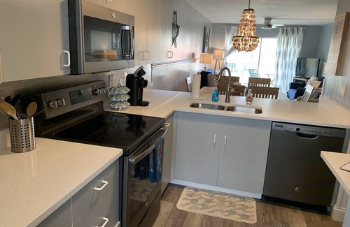 Point East Condo | 2/2 BEACHFRONT CONDO- No Drive Section