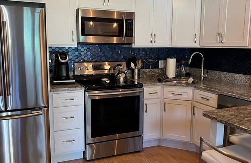 Gilford Condo | 2 Bed/1 Bath Saunders Bay Gilford with boat slip. Walk to Meadowbrook for a show