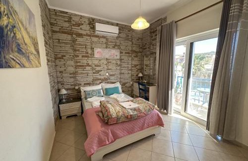 Platanias Town House | 2-Bedroom Blue & White House with Garden and Beach