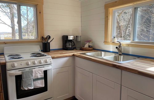 Rushford Lake Cottage | 2-bedroom lakefront cottage on Rushford Lake with private dock.