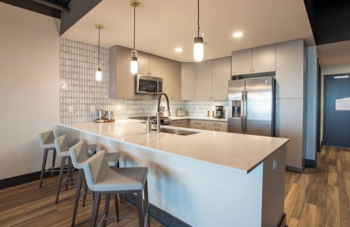 Downtown Buffalo Condo | 2 Bedroom Luxury Bi-Level Condo in Downtown Buffalo - Rooftop Bar, Bowling Alley