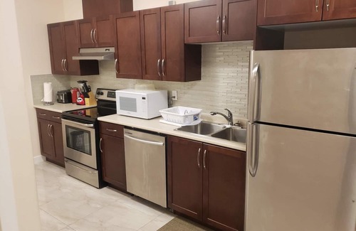 Timberlea House | 2 BR SUITE with Spacious Kitchen and Hi Speed Internet Ideal for Long Stays