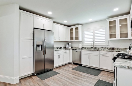 Whitfield House | 2 Master Suites - 2 King Beds - Waterfall Pool - 2 Kitchens