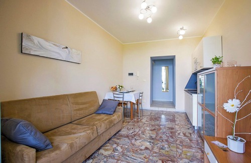 Carciano Apartment | 2-room apartment with terrace in an Art Nouveau villa with communal pool