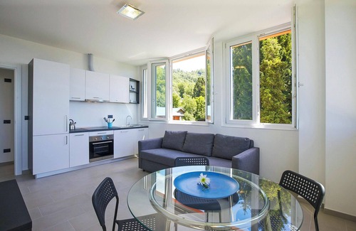 Comero Apartment | 2-room corner apartment in a prestigious villa from 1850 with solar-heated pool