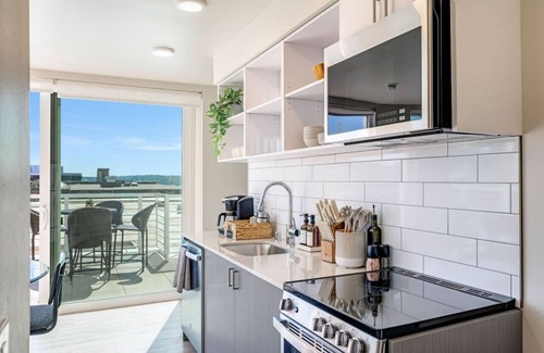 Lower Queen Anne Apartment | 2BR Apt Panoramic Seattle Views | Private Balcony