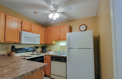 Weirs Beach Condo | 2BR Cozy Escape with Patio, Pool & Nearby Hiking