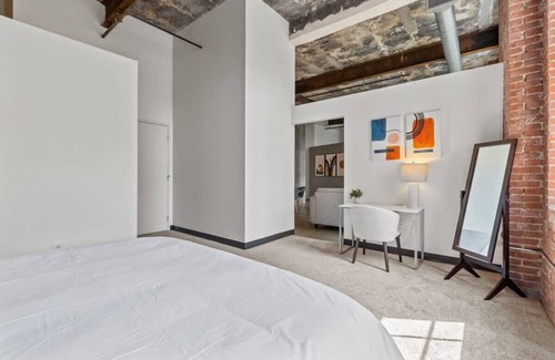 Strip District Apartment | 2BR Historic Loft Oasis With Pool & Gym
