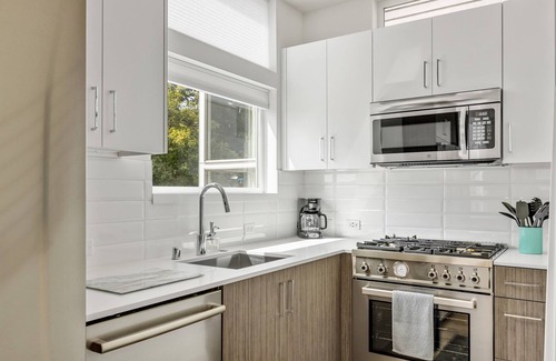 Minor House | 2BR Townhome w/City Skyline Views & Easy Parking!