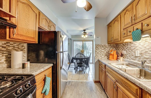 Country Club Hills Condo | 3 Mi to Credit Union 1 Amphitheatre: Suburban Stay