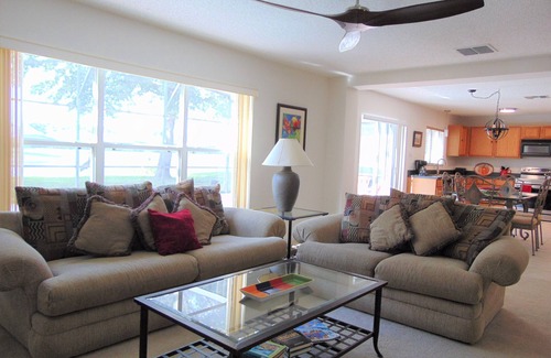 Sunrise Lakes House | 3000 sf fully fenced luxury waterfront home, private pool 15 min. from Disney!