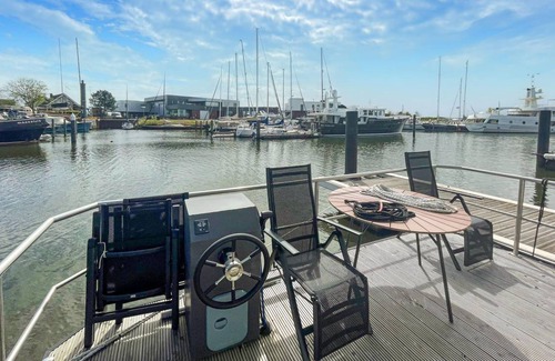 Municipality of Hellevoetsluis Boat Rental | 35 m² Houseboat ∙ 2 bedrooms ∙ 4 guests