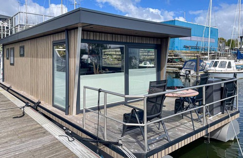 Municipality of Hellevoetsluis Boat Rental | 35 m² Houseboat ∙ 2 bedrooms ∙ 4 guests
