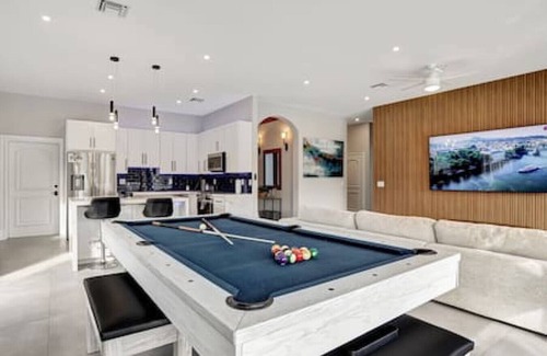 South New River Isles House | 3BR Waterfront Villa with Heated Pool, Spa, & Rooftop Deck