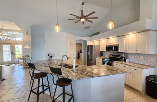 Burnt Store House | 4-bedroom Gulf access, heated pool, lanai, dock