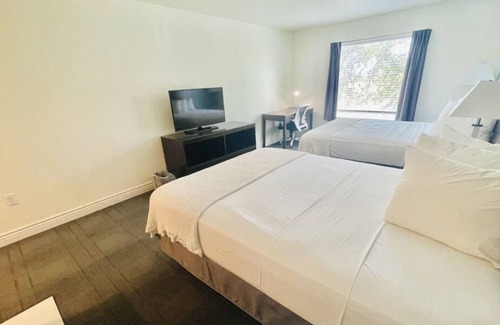 Cuero House | 4 Double Queen at FairBridge Inn & Suites Cuero, Free Parking!