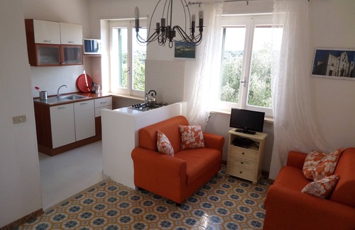Cisternino Apartment | 4 person, 1st floor appt. Shared, wonderful 9 m. terrace, pool and tennis crt.