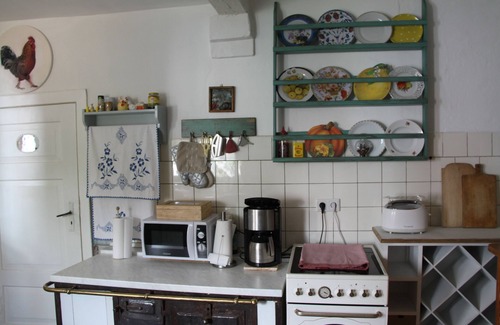 Luebz House | 4 star cottage with garden by the brook, art and antiques to 7 people