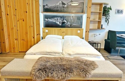 Champfer Apartment | 42m2 Alpenschick mit Balkon, Ausblick, Pool - E405