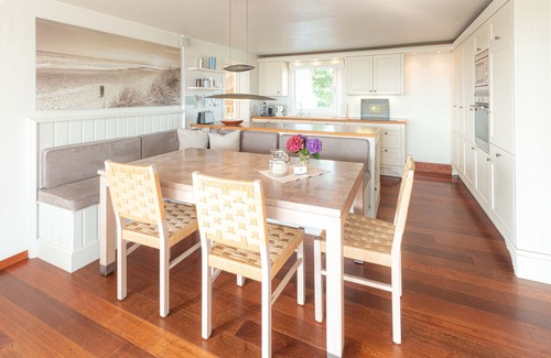 Sudbrookmerland House | 5 star holiday home with unobstructed sea views, direct waterfront and a private boat.