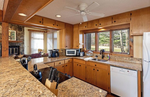 Chestnut Springs House | 5min to Ski! Bedroom w/o Steps Golden Tee Sun Room