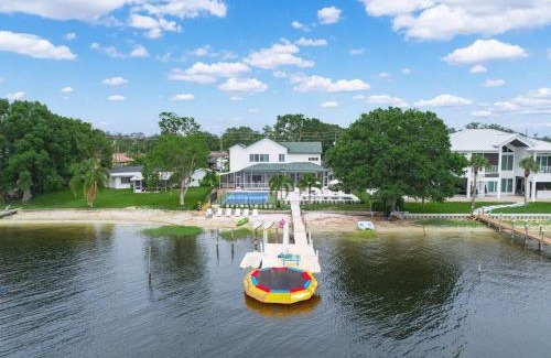 Sebring House | 6BR Lakefront Home w Pool Pickleball More