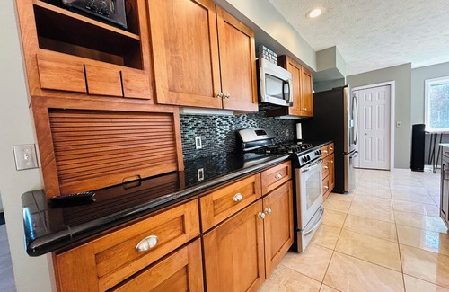 Acme House | 7-Bedroom House with Amazing Deck & Backyard! Near TC, Wineries, Resort, Beach!
