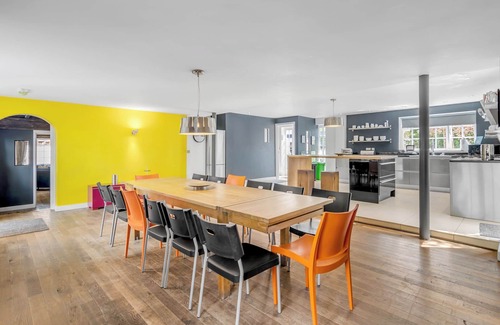Stoke Ferry House | 7 Storey Listed Windmill, dog friendly with outdoor pool & bbq