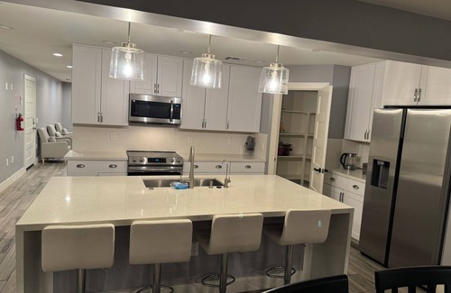 Estrella Village House | 9-Bedroom 7 bath Phoenix home with Modern Amenities & Patio Access & Events