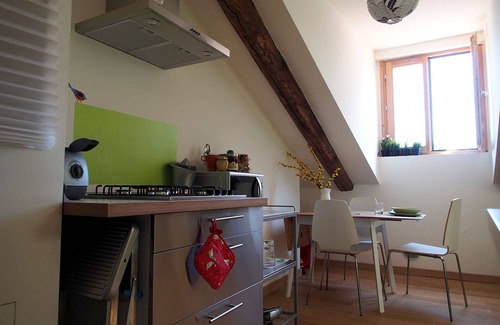 Vanchiglia Apartment | A cozy bohemian rooftop nest in downtown Turin