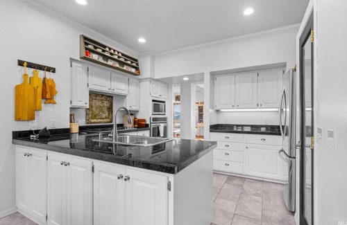 Lewiston House | A golf course home with game room and amazing outdoor space.