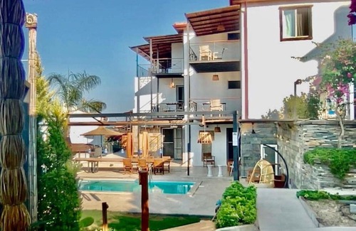 Phitsanulok Apartment | A house with a swimming pool and a garden. Free barbecue place