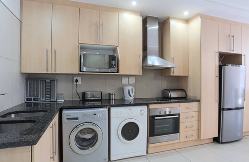 Sandown Apartment | A safe, modern family space 5-min away from the Famous Sandton City