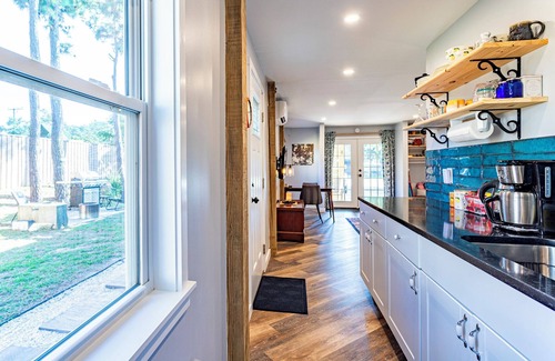 Colington Apartment | A Stylish Suite in the Heart of the Outer Banks with a Private Gym and Hot Tub.