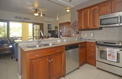 Cocoplum Condo | A Tropical Treasure - 'Gibnut' Oceanfront Condo