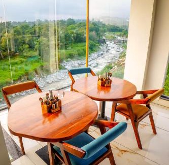 Sheehla Hotel | Aachman River and Valley View Resort Dharamshala - A riverside resort with balcony view