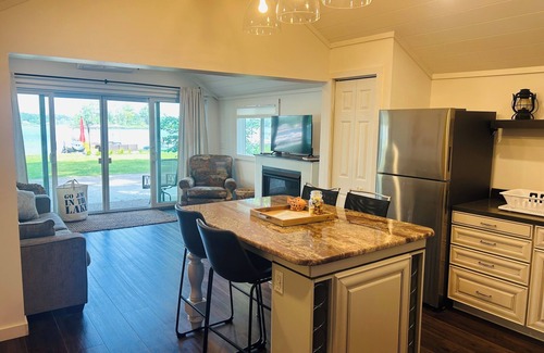 Sand Creek Cottage | Adorable Lakeside Cottage with Lake Views, Kayaks and a Canoe