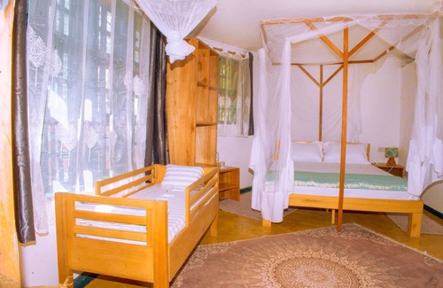 Iringa Bed & Breakfast | Aika Sunrise Treetops Home