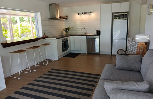 Muri Villa | Aircon, 5 bedroom home on ocean front in Rarotonga! With kids playground, 12pax