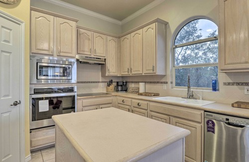 Travis Landing Villa | Airy Villa in Austin w/Badminton/Volleyball Court