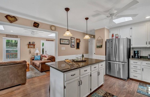Westlake Corner House | All Decked Out-Features a game room, ping-pong table, large-screen TV and kayaks!