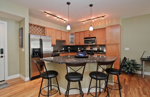 Jefferson Park Condo | All new furniture, heated garage, newer building location makes this a MUST!